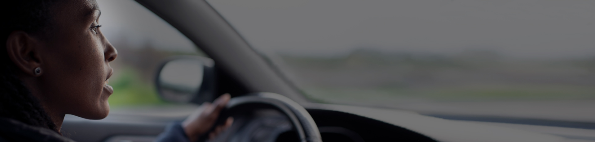 Picture of a woman receiving road side assistance